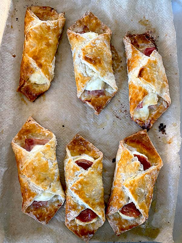 Cheese and ham and pepperoni puffs cooked