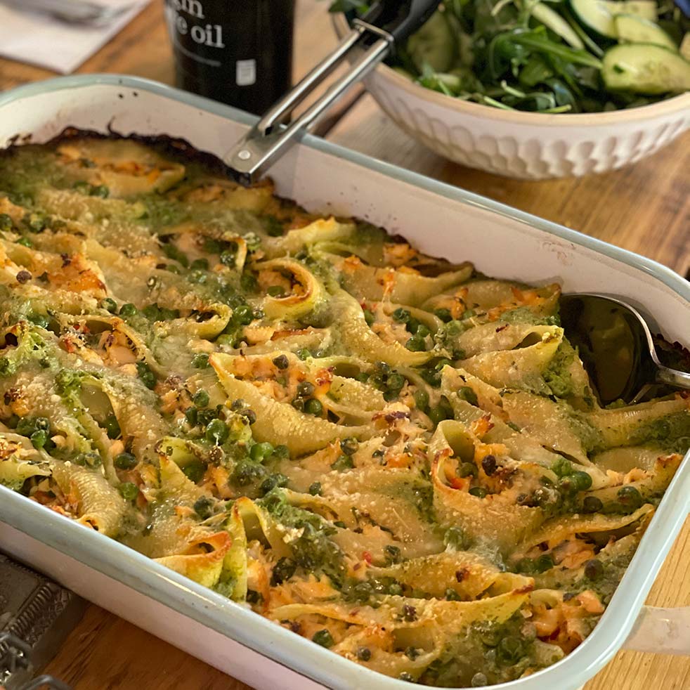 Salmon filled pasta shells with pea sauce