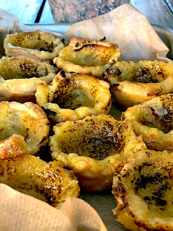 Cooked cardamom custard tarts