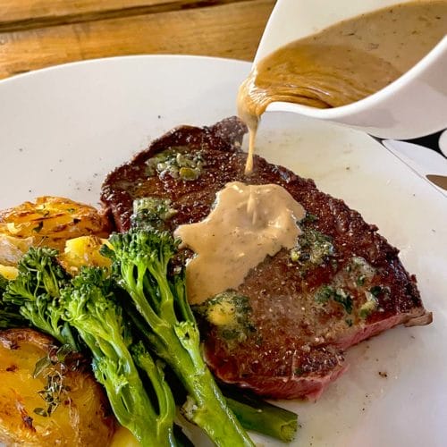 Peppercorn sauce served with sirloin steak