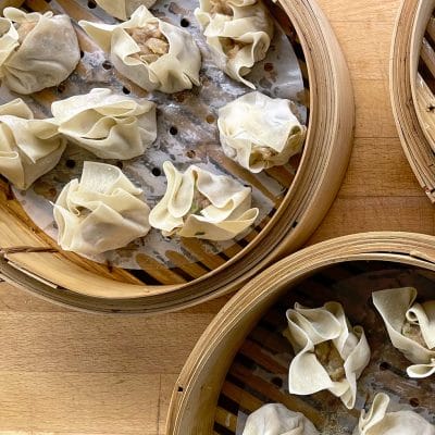 Siu mai dumplings in steamer baskets