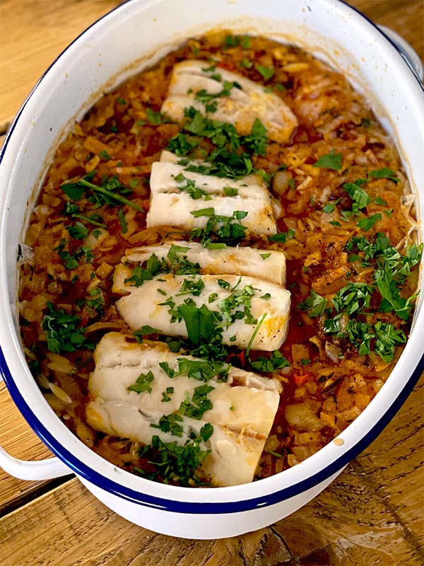 Cod and chorizo bake served