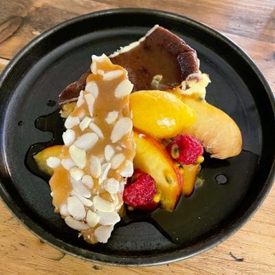 Basque Cheesecake with Maple Peaches and Almond Brittle
