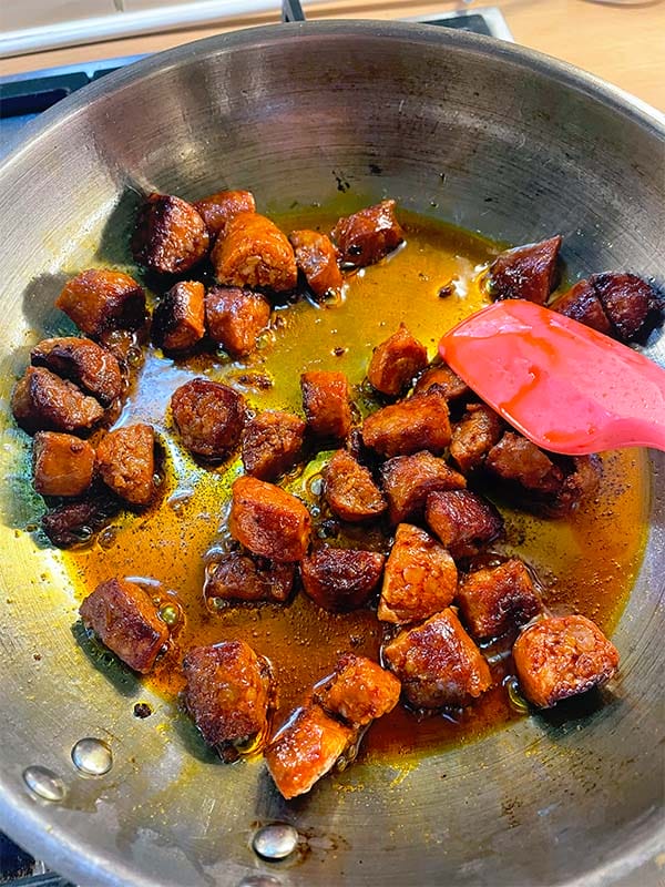 Frying chorizo pieces