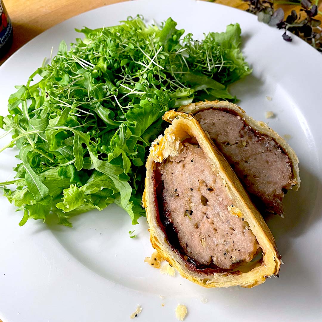 Giant sausage roll with cranberry