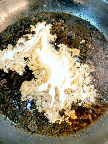 Stir cream into porcini mushroom sauce