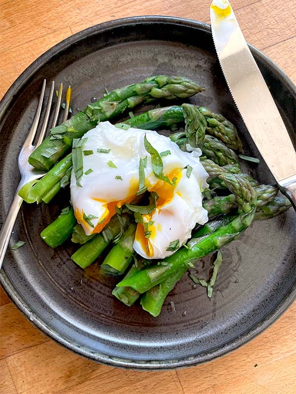 Asparagus with poached egg and tarragon served