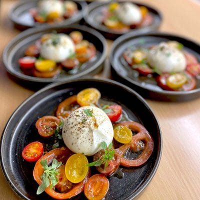 Marinated tomatoes with burrata