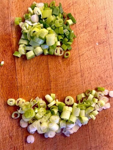 Separate spring onion green and white bits