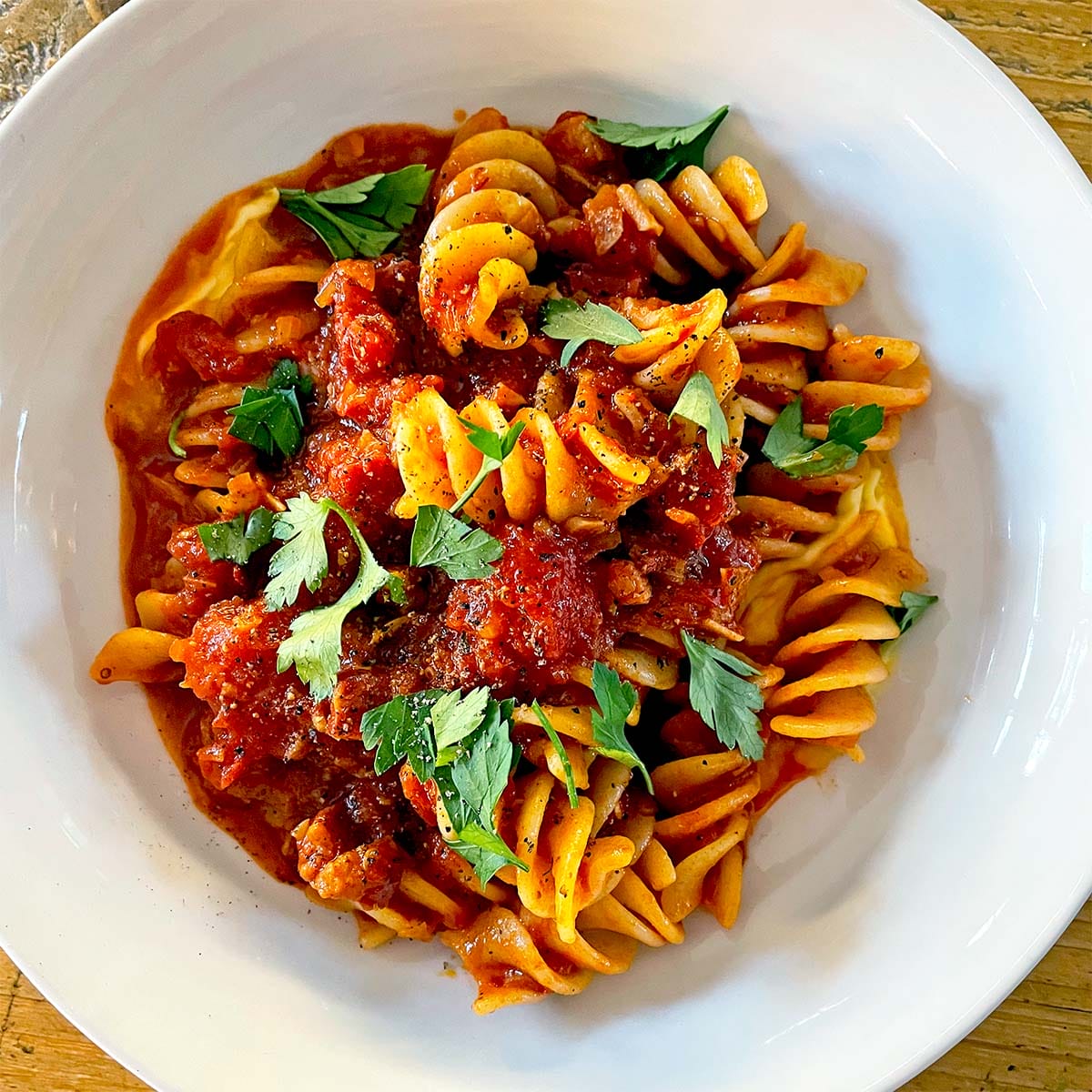 Harissa tomato and bacon pasta