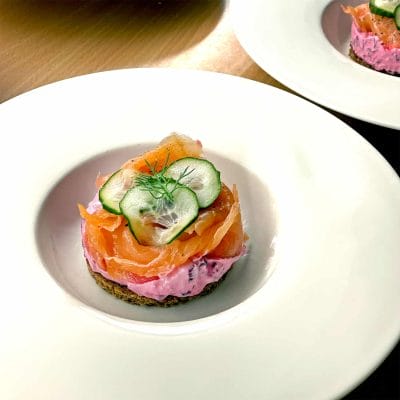 Beetroot ricotta smoked salmon on rye bread