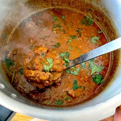 Lamb in coconut and tomato curry sauce