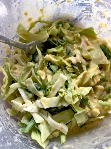 Mixing the vegetables with the batter