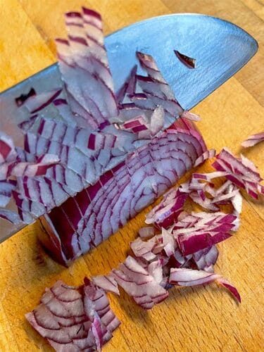 Finely chop red onion