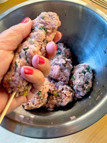 Thread the minced lamb on to a wooden skewer