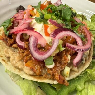 Beef Chilli Tostada with Refried Beans
